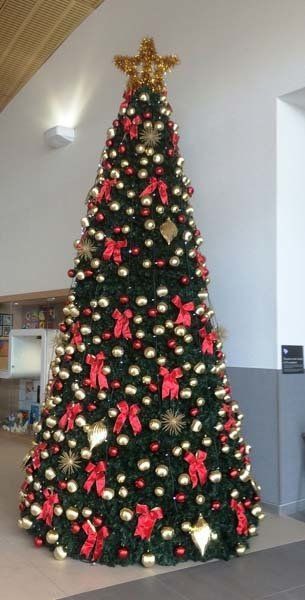 Christmas tree with red bows and gold bulbs