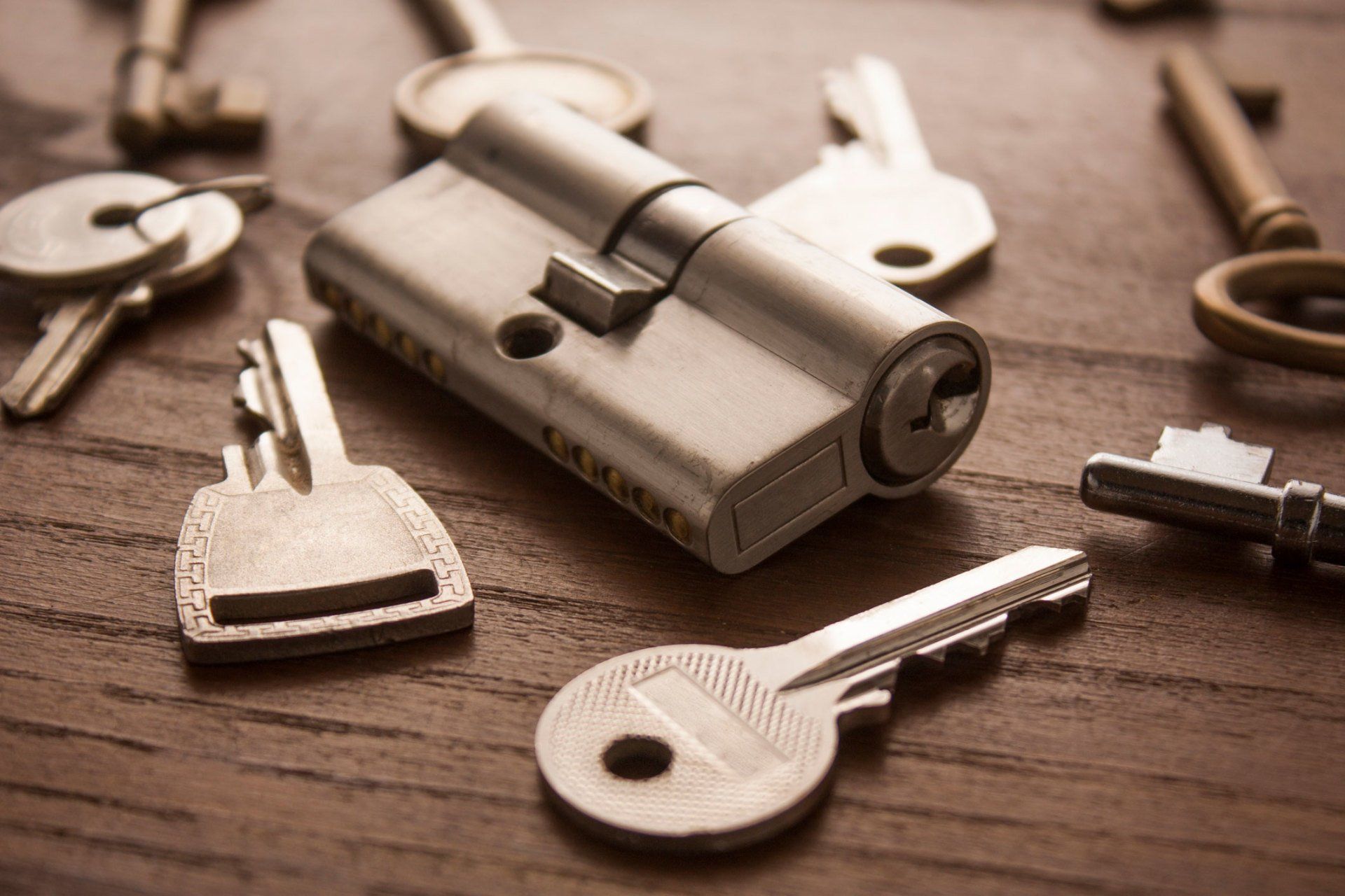 Door Lock With Keys on Wooden Table — Chattanooga, TN — AAA Lock & Key