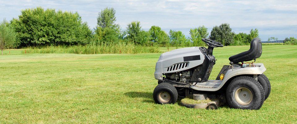 grey ride on garden mower