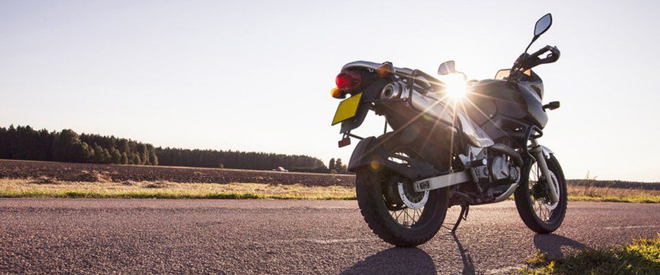 motorcycle parked on country roadside