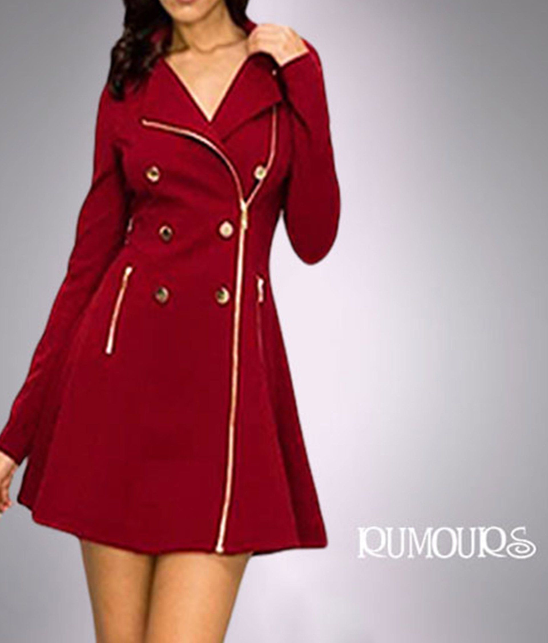 Red coat with gold zippers and buttons on a woman.