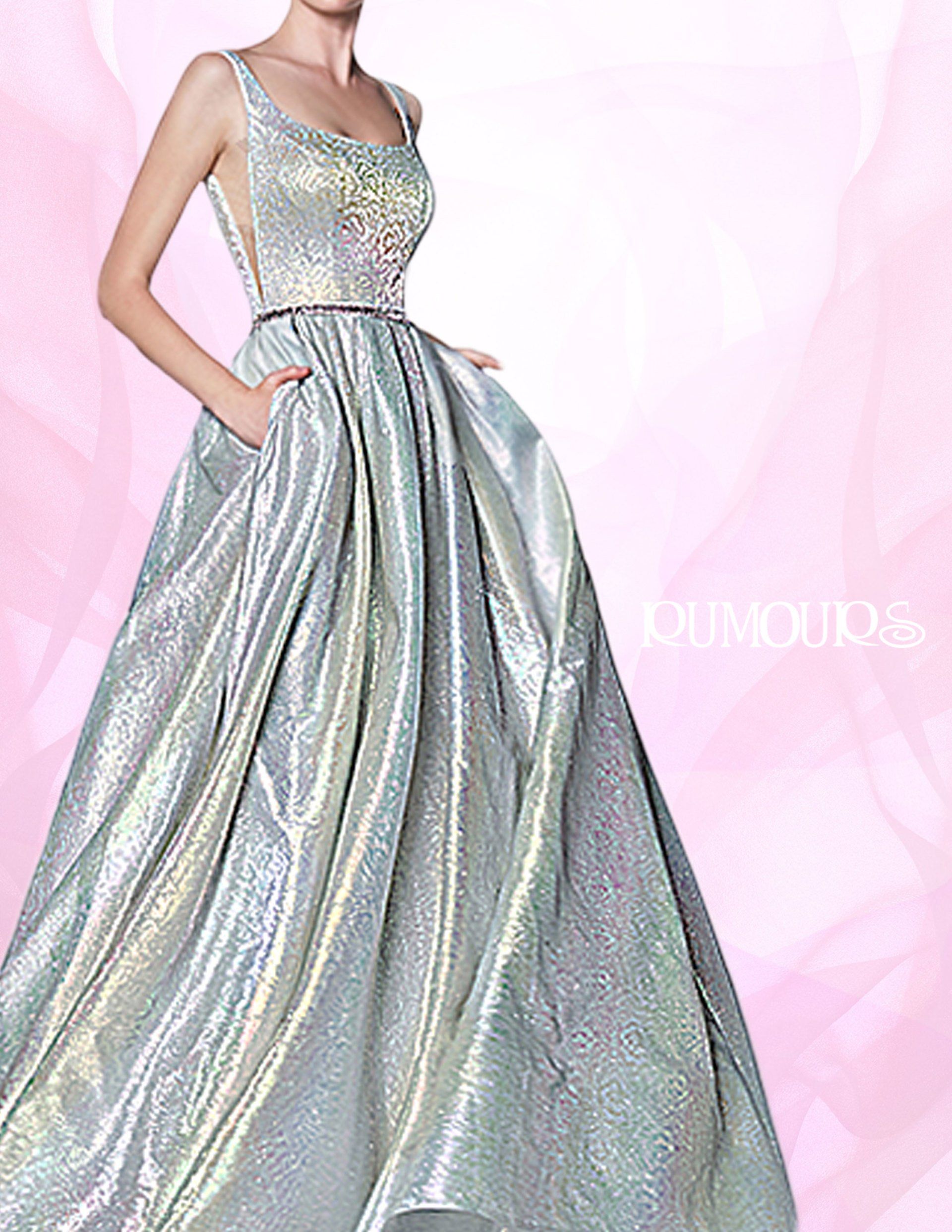 Woman in a shimmering silver evening gown with a scoop neck, pockets, and a wide skirt.