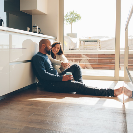 Couple sitting on floor