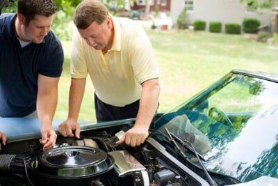 Law Office — Father and Son Repairing Car in York, PA Law Office — Father and Son Repairing Car in York, PA