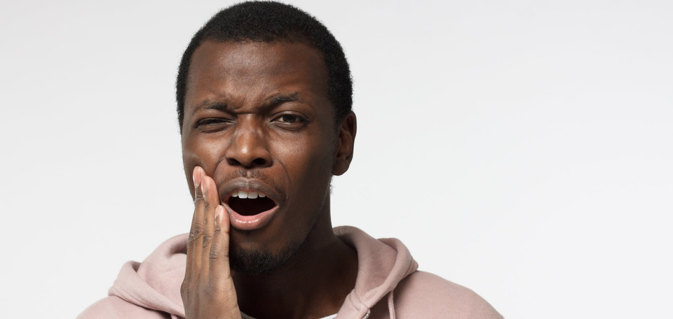man with toothache