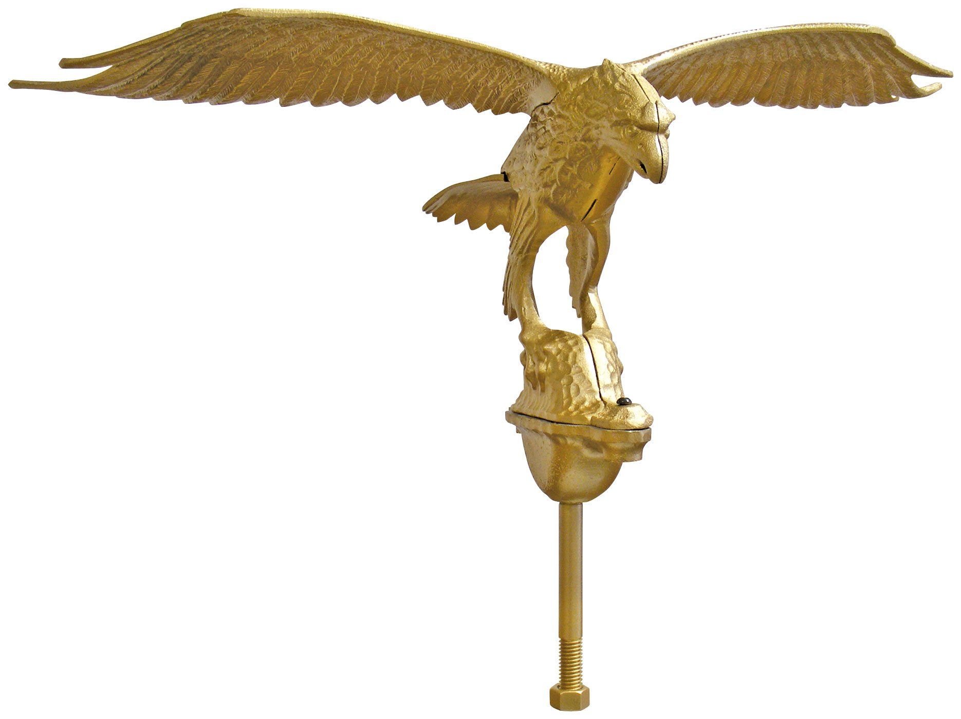 A gold statue of an eagle on top of a pole
