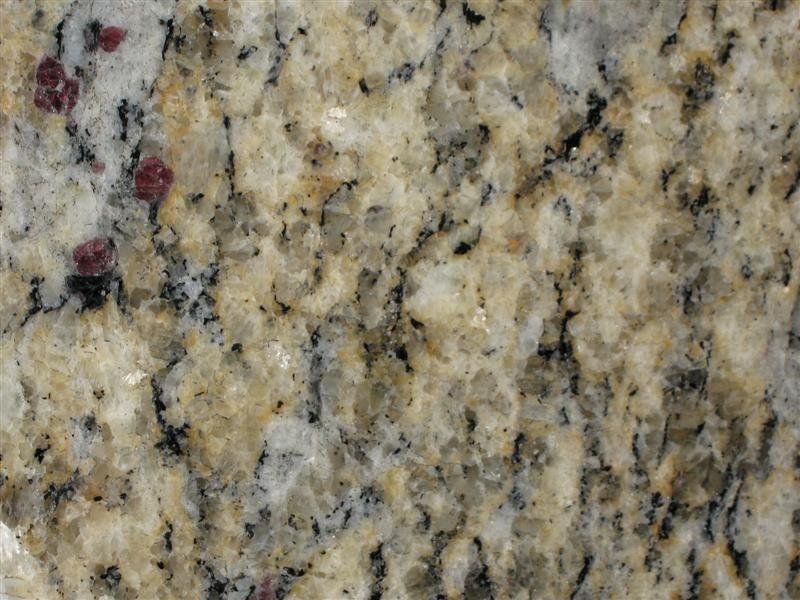 A close up of a granite counter top with a marble texture.