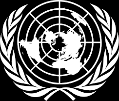 A white logo for the united nations with a globe and laurel wreath.