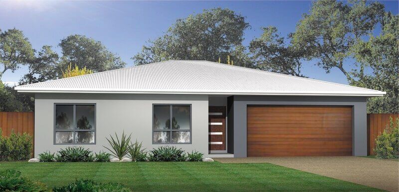 A house with a white roof and a wooden garage door