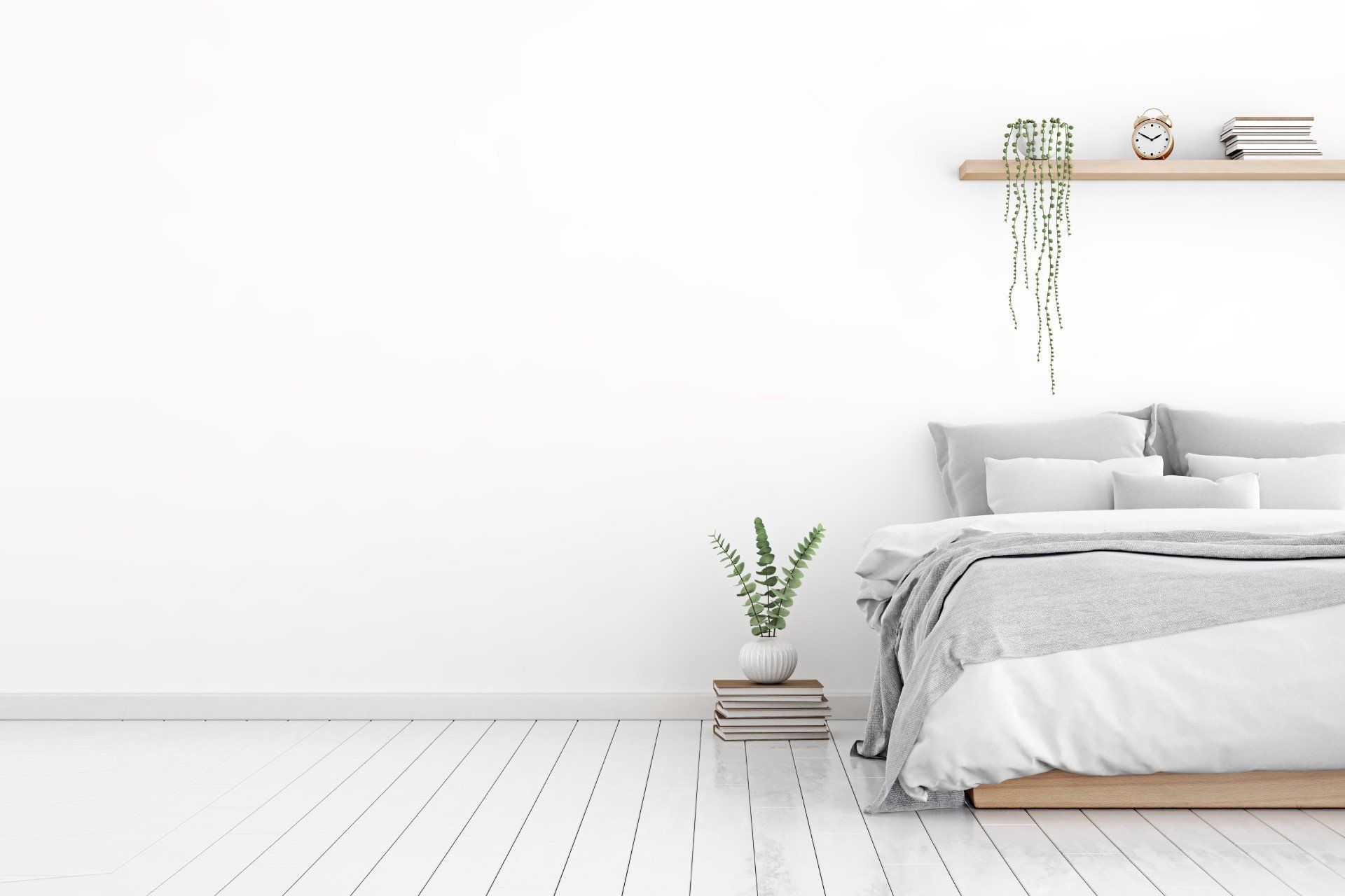 camera da letto con arredi color grigio chiaro e bianco
