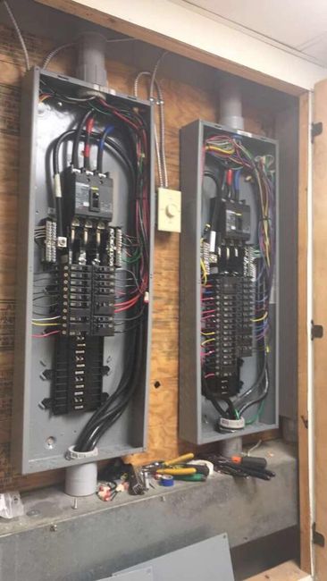 Electrician inspecting electric wires Electrician inspecting electric wires