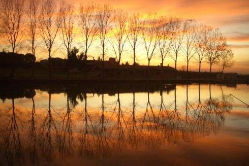 Quadro di paesaggio al tramonto