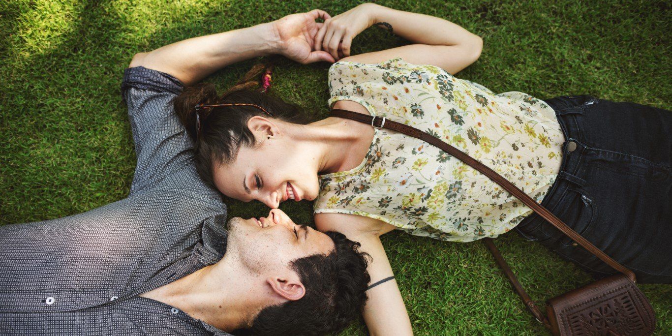 Couple Relaxing on the Grass - Cooks Hill Counselling