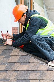 Roofing Installations — Man Repairing The Roof in Chester, PA Roofing Installations — Man Repairing The Roof in Chester, PA
