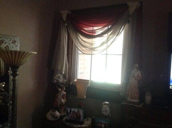 Window with beautiful curtain — vinyl replacement windows in Elizabethton, TN