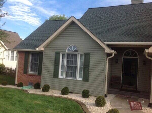 Window with beautiful curtain — vinyl replacement windows in Elizabethton, TN