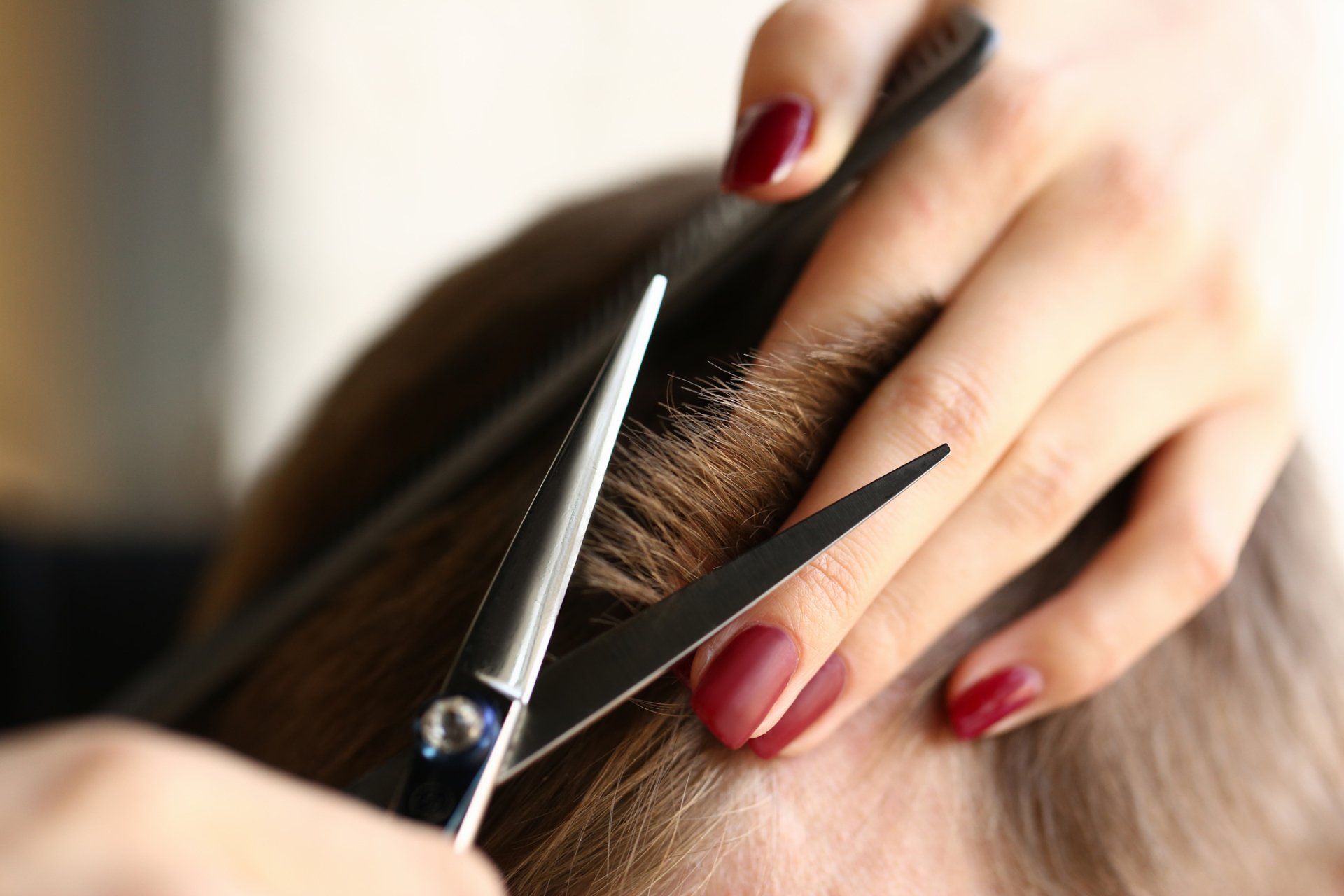 Barber Making Haircut to Attractive Man — Troy, MI — The Hair Studio of Troy