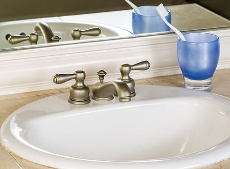 DDS — Tooth Brush and Cup on Bathroom Sink in Mansfield, OH DDS — Tooth Brush and Cup on Bathroom Sink in Mansfield, OH
