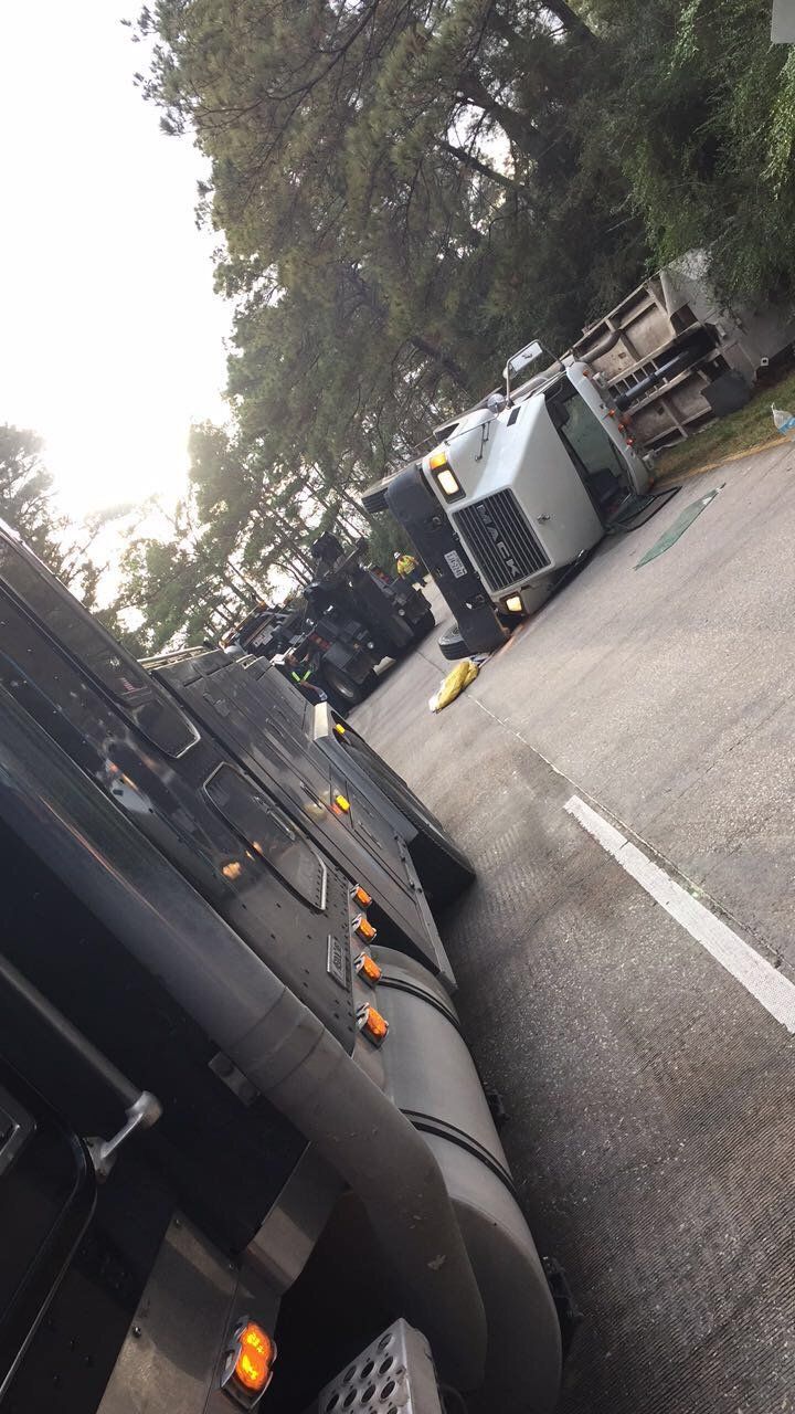 Semi-truck Towing — White Semi-truck Tipped Over on Side Road in Houston, TX