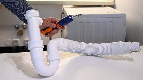 A person using our appliance parts on a home in Sydney