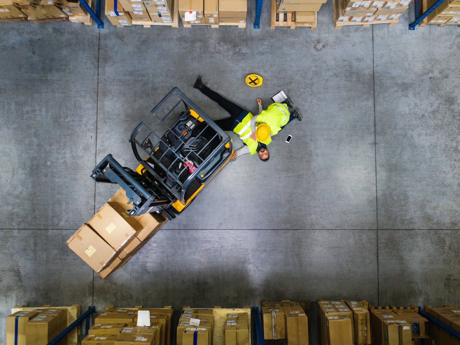 Warehouse workers after an accident in a warehouse.