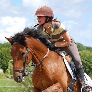 lady riding the horse