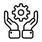 A pair of hands holding a gear in their hands.
