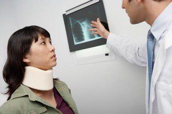 Doctor Showing an X-ray to Patient - Personal injury in Oxford, MS Doctor Showing an X-ray to Patient - Personal injury in Oxford, MS