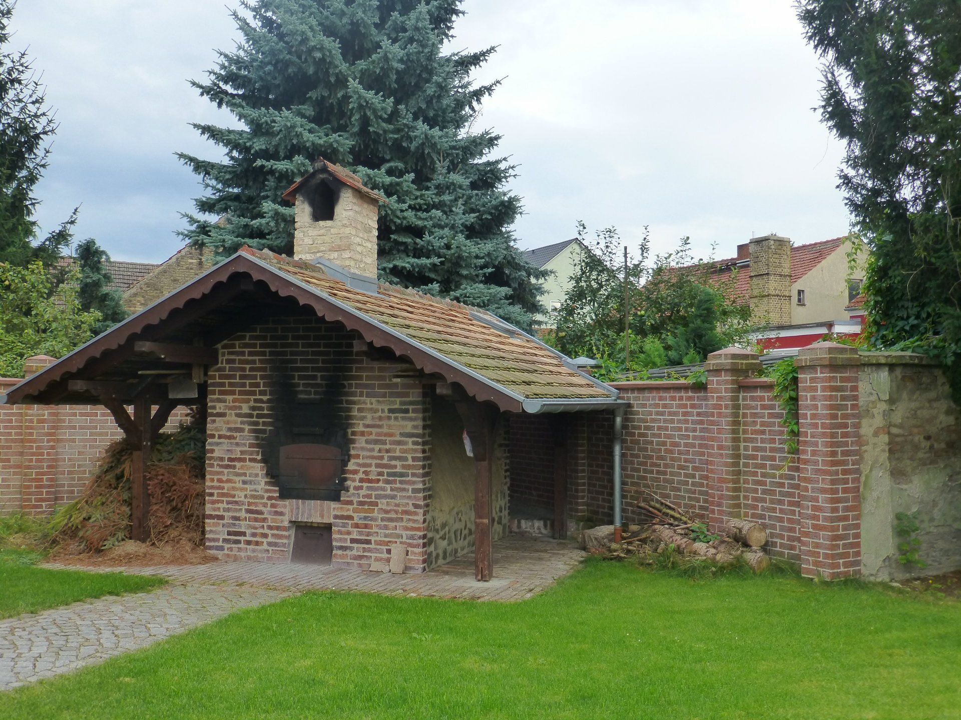 A brick building with a chimney on top of it