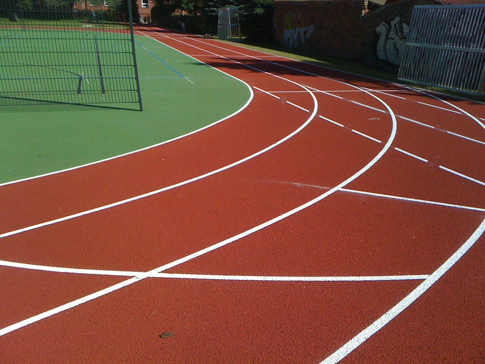 A running track with white lines on it