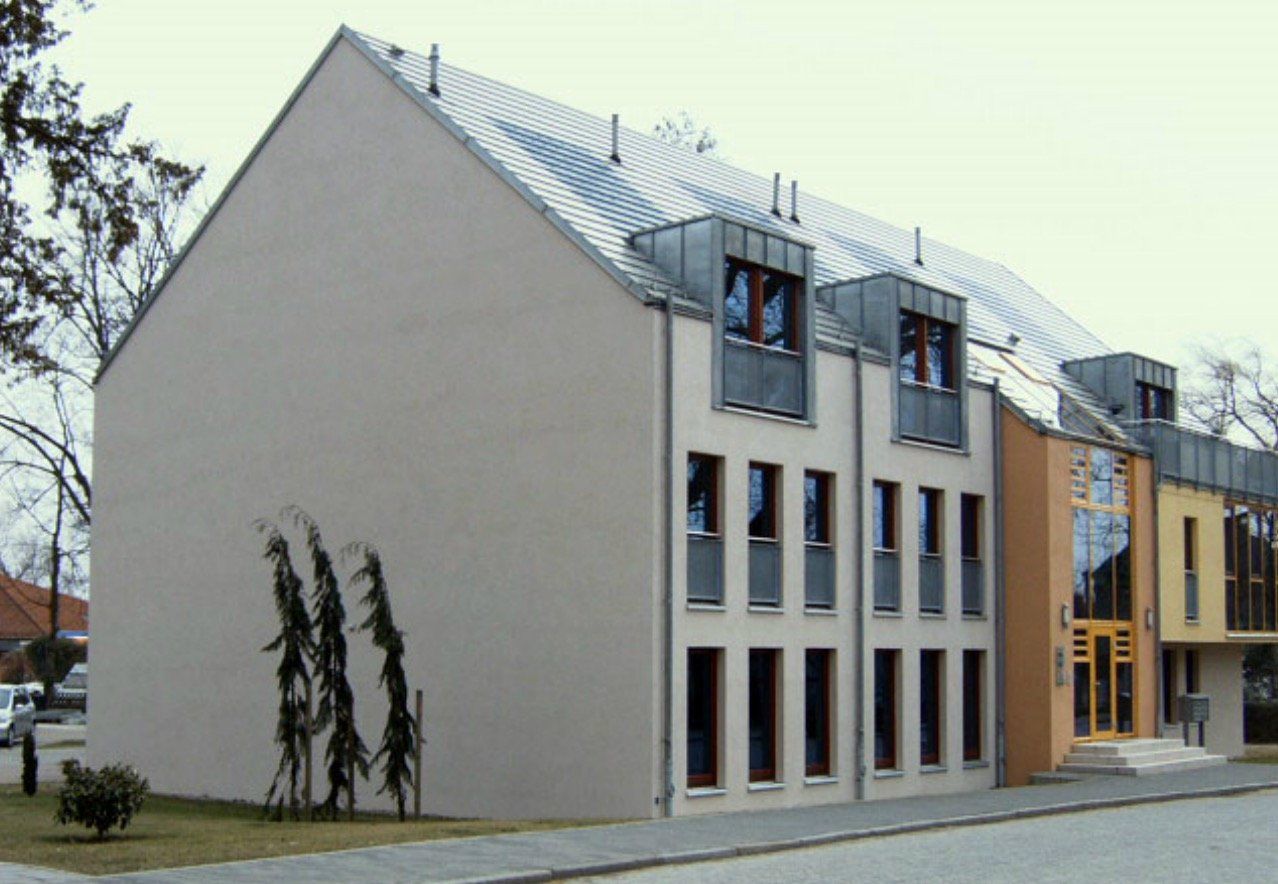 A building with a lot of windows and a roof