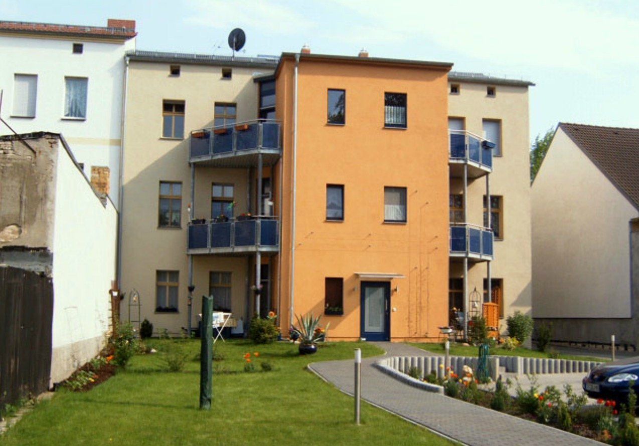 A building with a satellite dish on top of it