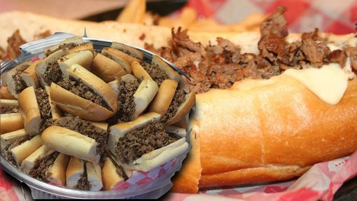 Open sandwich with fries and a small cup of dark sauce on a red-checkered tray