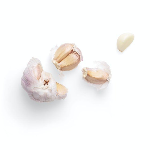 Garlic cloves representing garlic that is the main ingredient in our organic mosquito control