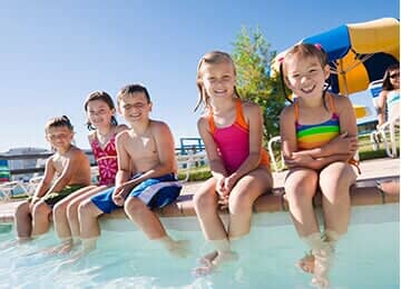 Kids at the pool - Swimming Pool Cover & Enclosure Dealers in Mechanicsburg, PA Kids at the pool - Swimming Pool Cover & Enclosure Dealers in Mechanicsburg, PA