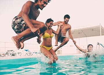 Couples in swimming pool - Swimming Pool Cover & Enclosure Dealers in Mechanicsburg, PA Couples in swimming pool - Swimming Pool Cover & Enclosure Dealers in Mechanicsburg, PA