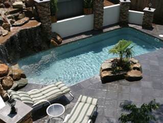 Swimming Pool with Sun Beds — Shippensburg, PA — Cumberland Valley Pools LLC