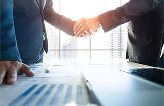 Men Shaking Hands with Each Other — Cash corporate checks orange in Orange, NJ Men Shaking Hands with Each Other — Cash corporate checks orange in Orange, NJ