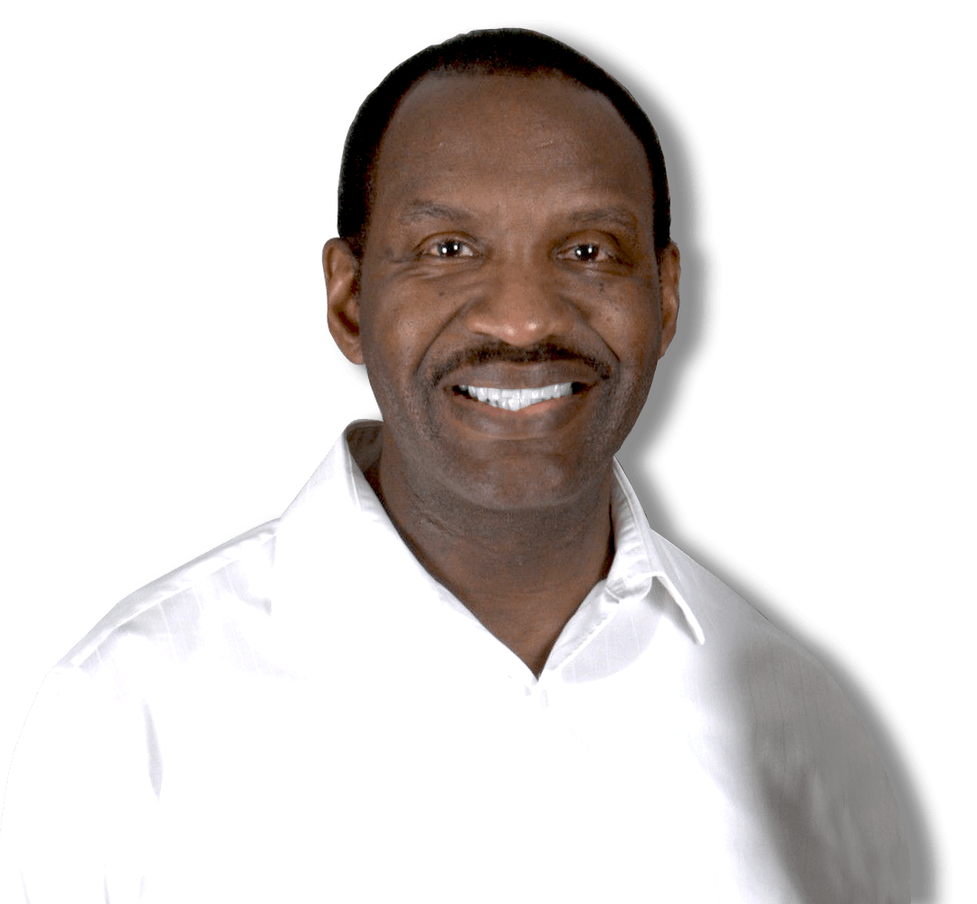 Portrait of a smiling man in a white shirt against a plain white background