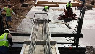 Concrete Screeding — Workers Working in Longmont, CO Concrete Screeding — Workers Working in Longmont, CO