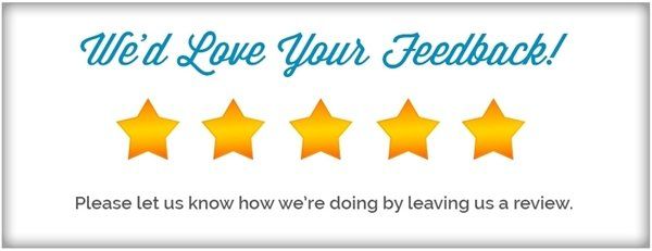 A sign that says we 'd love your feedback