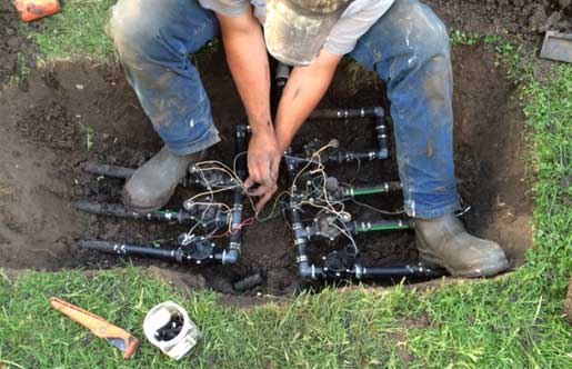gi sprinkler guy setting sprinkler heads