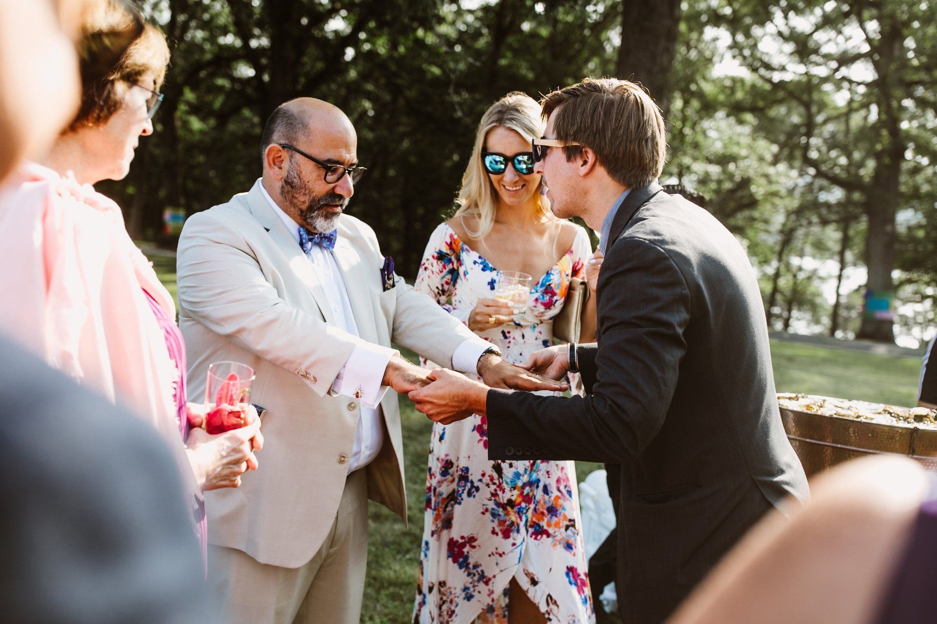 Wedding guests look on