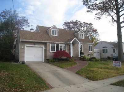 siding installation by Arrow Home Improvements in Seaford NY