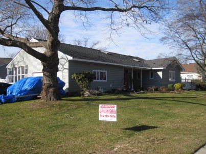 siding installation by Arrow Home Improvements in Seaford NY