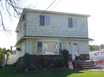 siding installation by Arrow Home Improvements in Seaford NY