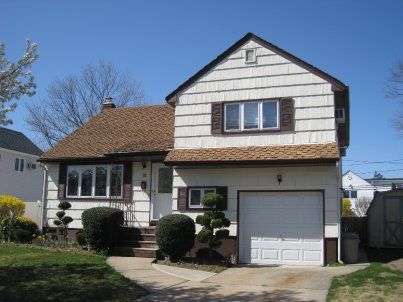 siding installation by Arrow Home Improvements in Seaford NY