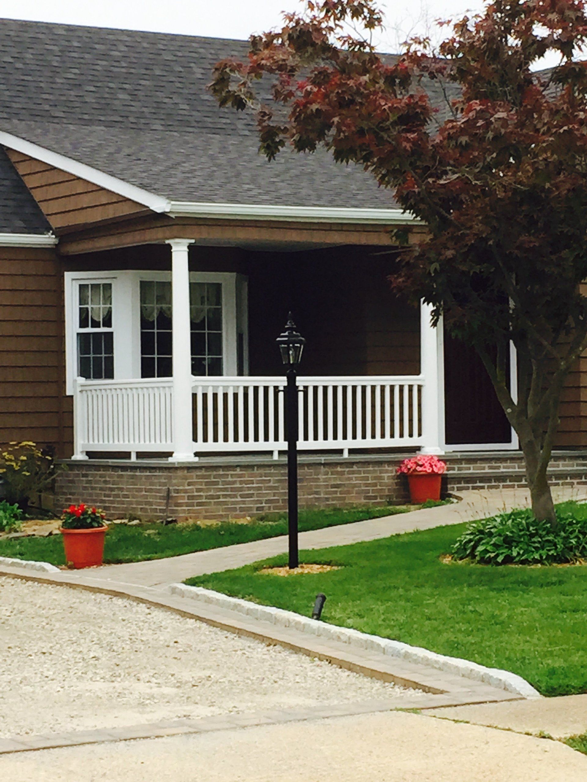 completed porch with white railings
