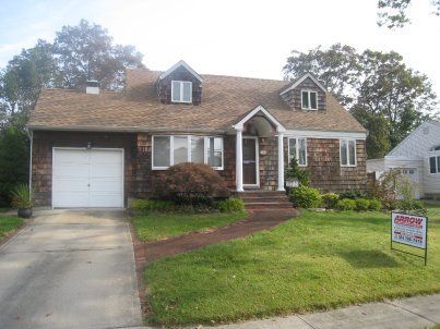 siding installation by Arrow Home Improvements in Seaford NY