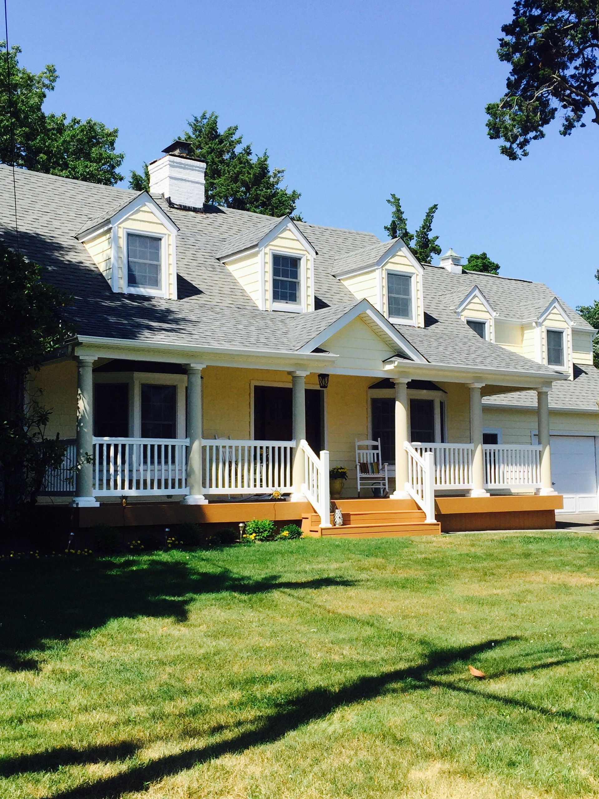 completed porch with white railings